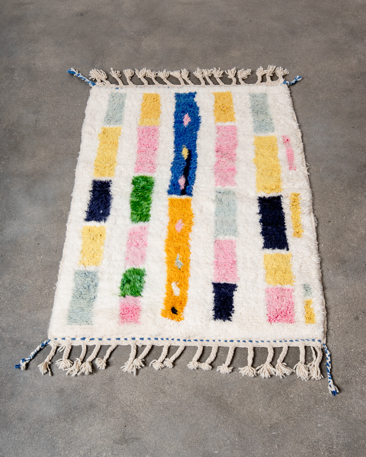 Modern, designer, handcrafted Berber rug from Morocco. Beniourain carpet with beautiful colours and patterns and fluffy wool texture.
